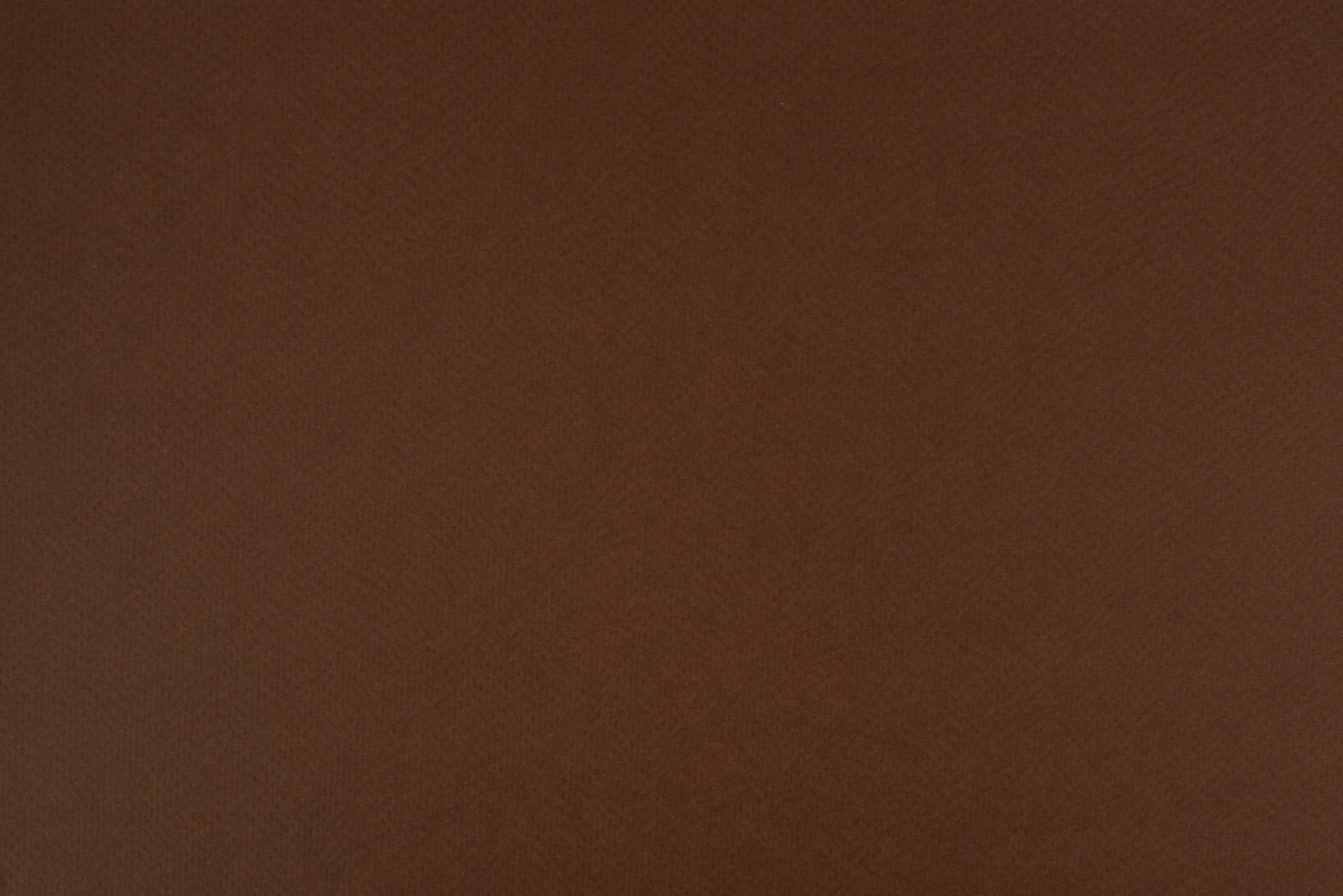 Brown paper background. Pecan brown colour paper texture.
